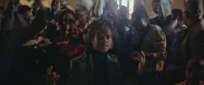 Koffee and Gunna enter the eye of the storm for the “W” video