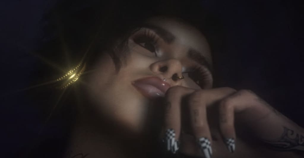 Kehlani goes camming in the NSFW “Can I” music video, cuts Tory Lanez