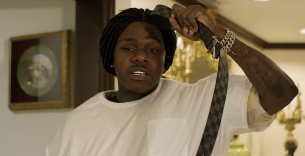 Rapper Dababy knocks out Cam coldheart in Louis Vuitton Store