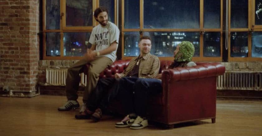 #Wiki, Earl Sweatshirt, and Navy Blue post up on a couch in “All I Need” video