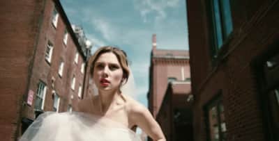 Wolf Alice’s Ellie Rowsell is a bride on the run in the band’s new “Space &amp; Time” video