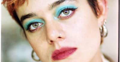 Pixx turns an office into the dancefloor in her “Andean Condor” video