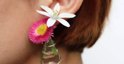 These tiny vase earrings can hold actual flowers