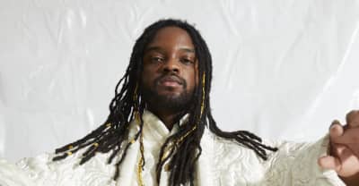 Genesis Owusu claws through spacetime in “Black Dogs!” video