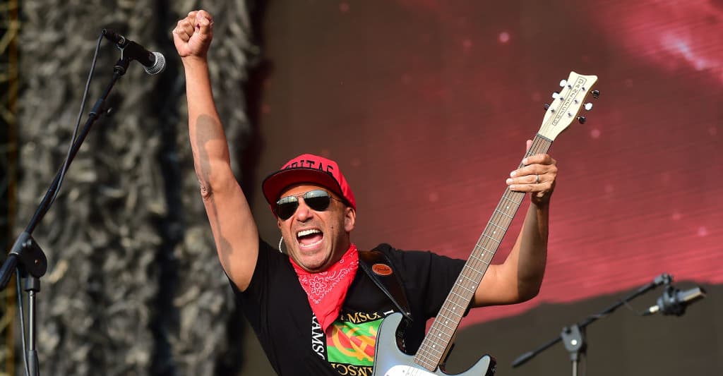 Rage Against The Machine's Tom Morello performs at strip club in solidarity  with unionized dancers