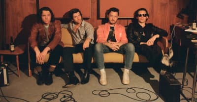Arctic Monkeys share new song “There’d Better Be A Mirrorball”