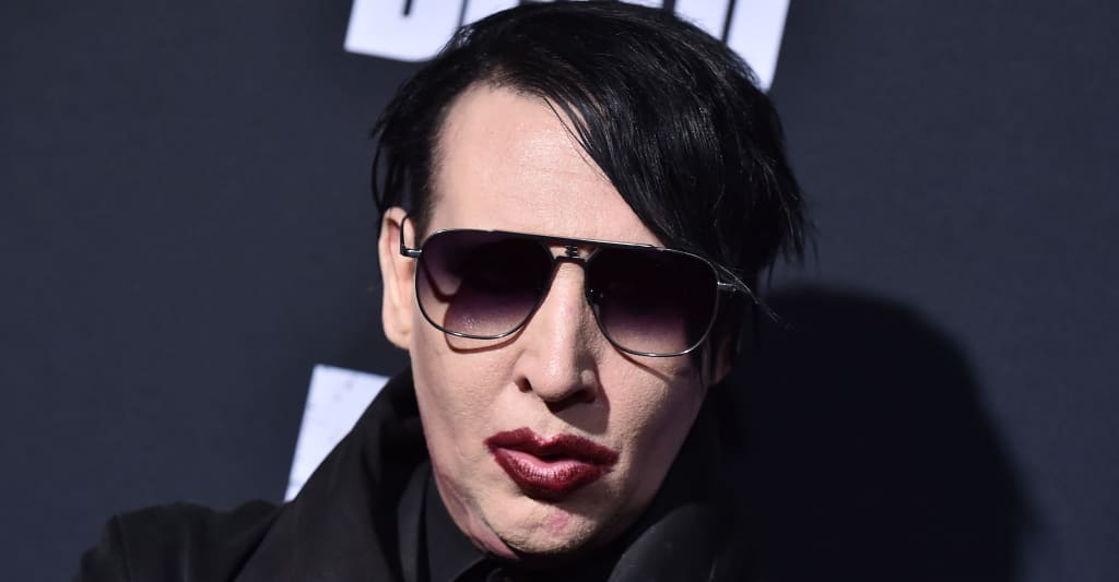#Marilyn Manson settles rape lawsuit