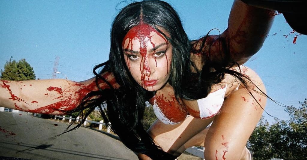 #Charli XCX adds four new songs to CRASH (Deluxe)