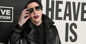 Police investigating Marilyn Manson domestic abuse claims search his LA home