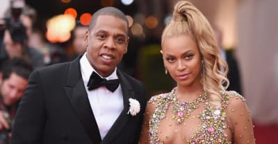 Watch Beyoncé and JAY-Z accept a BRIT Award in front of a Meghan Markle portrait