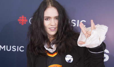 Grimes on last album Art Angels: “it feels like a stain on my life.”