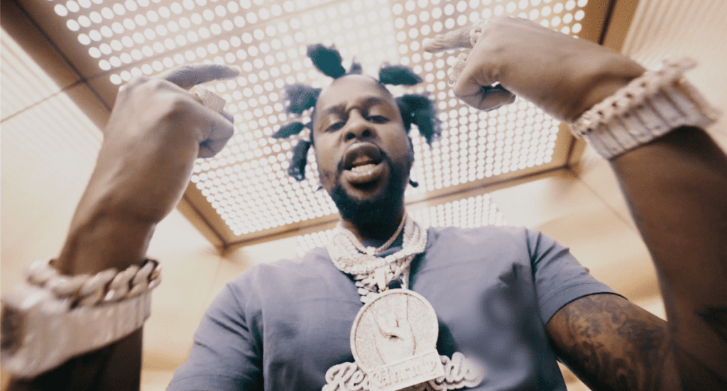 #Popcaan invests in his future for the “Skeleton Cartier” video