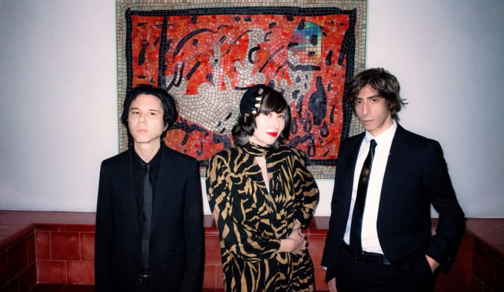 Dressed up and stripped back: Yeah Yeah Yeahs celebrate 25 years together
