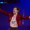 Harry Styles struck in the face by unidentified item thrown during Austria gig