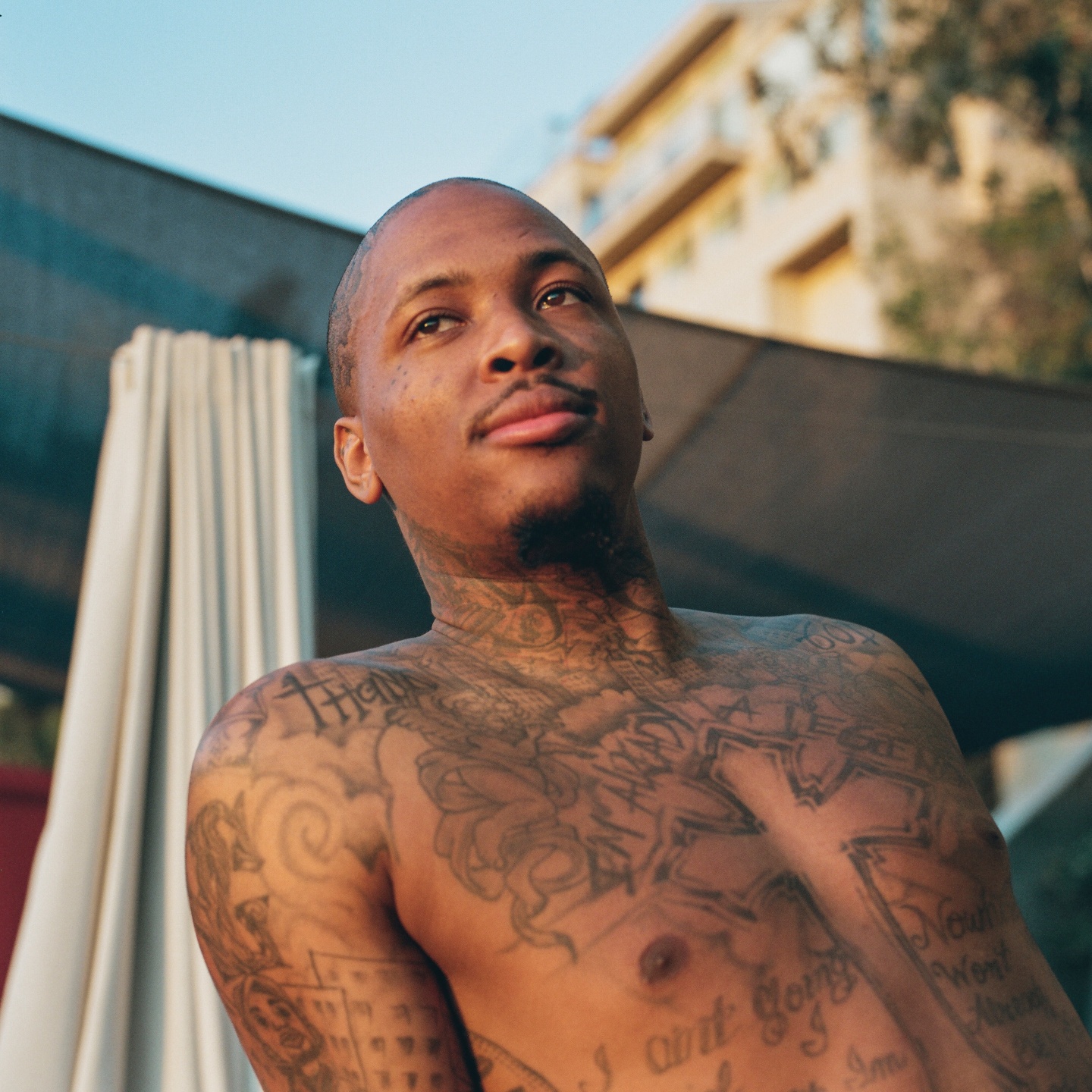 YG Pushaz forearm tattoo