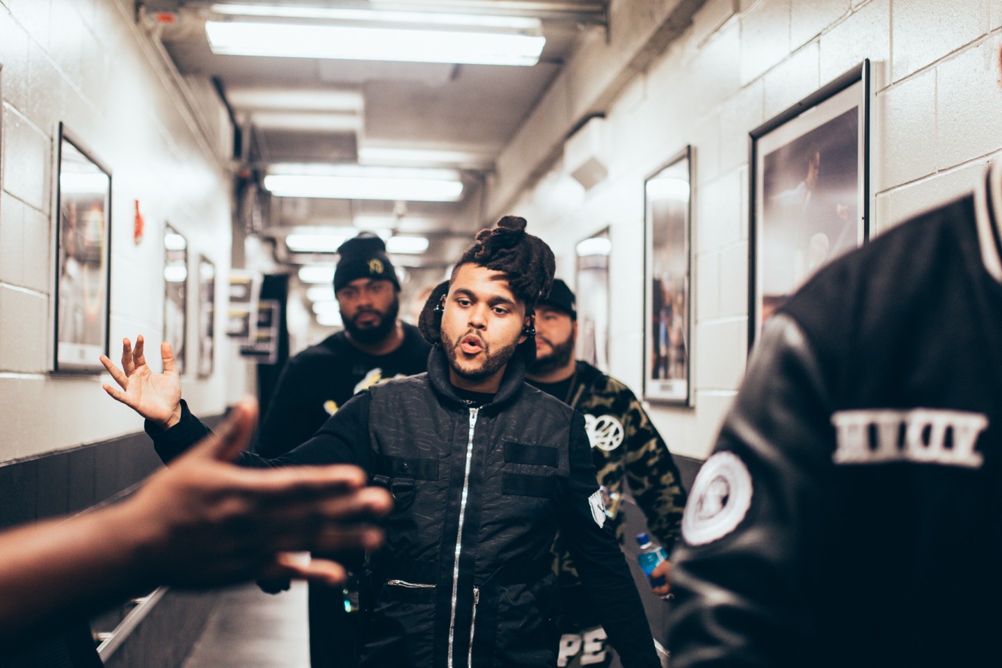 The Weeknd chats on the phone during a holiday shopping excursion in  Beverly Hills