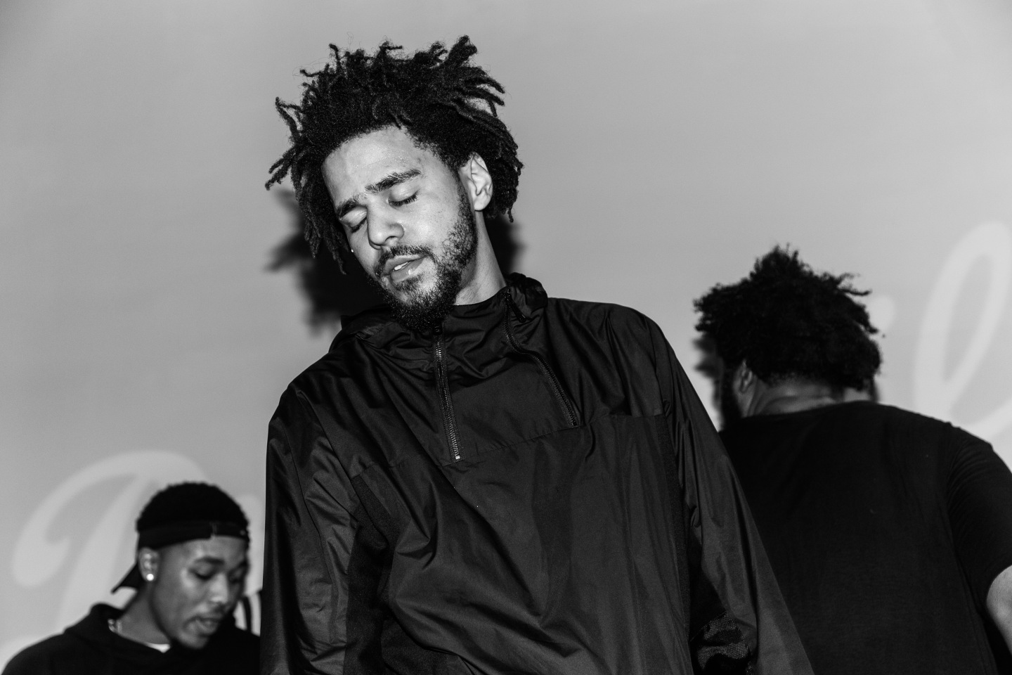 Inside J. Cole and Dreamville’s Surprise New York Bar Crawl 