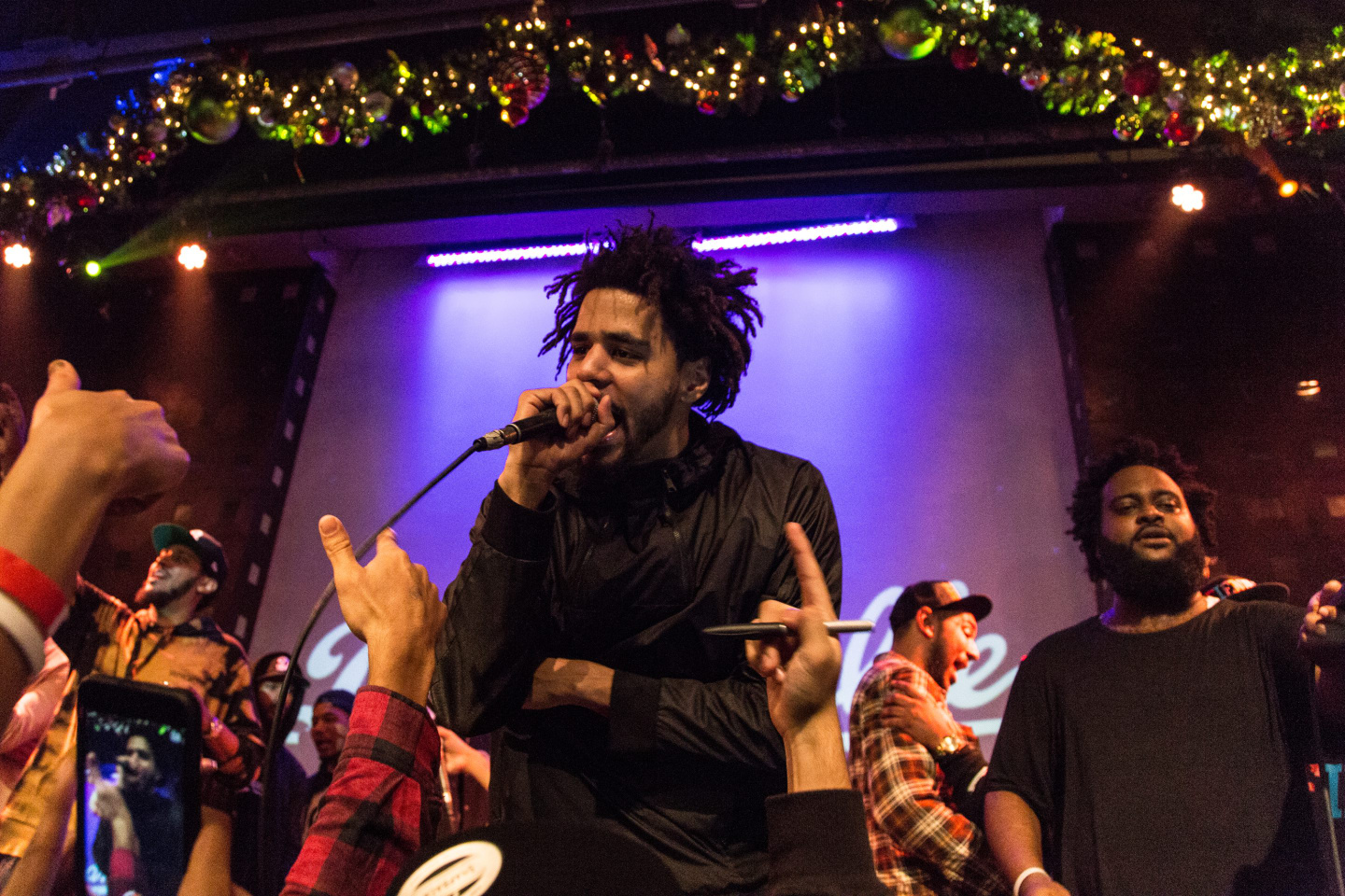 Inside J. Cole and Dreamville’s Surprise New York Bar Crawl 