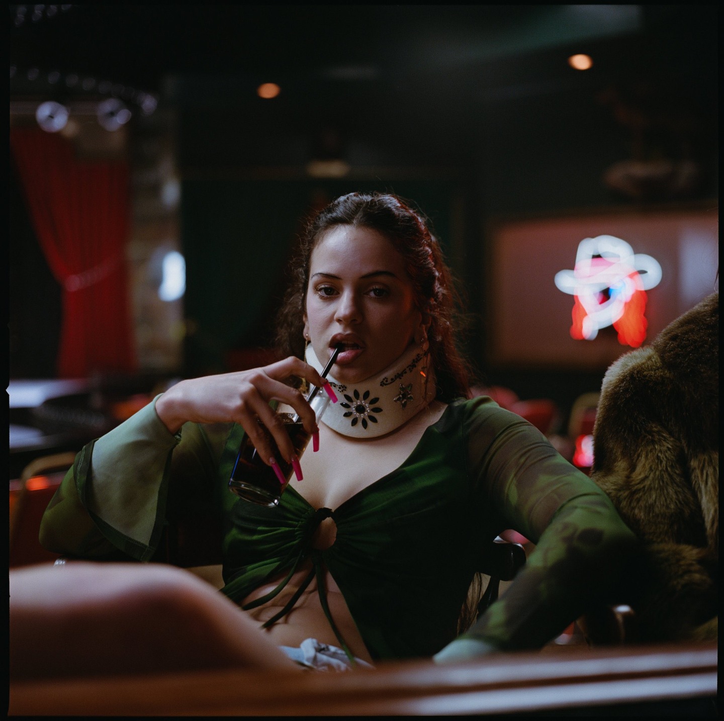 Behind Rosalía’s bedazzled neck brace and <i>Euphoria</i>’s mature new aesthetic
