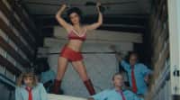 Charli XCX turns mattress saleswoman in the “Hot In It” video
