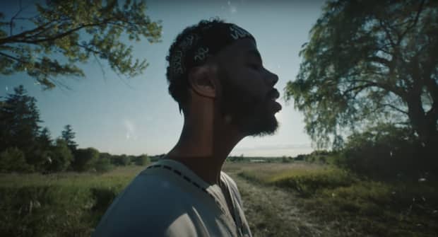 Mustafa shows off his community in the “Air Forces” video