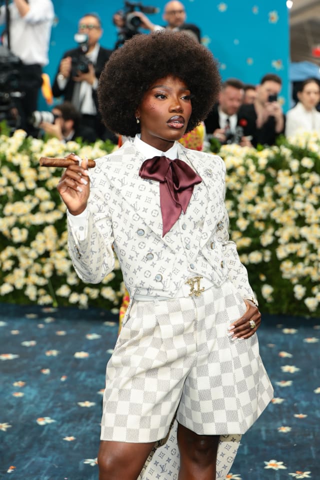 doechii cigarette Doechii's Met Gala cigar was the dandiest accessory of the night Doechii Wears Louis Vuitton Stamp