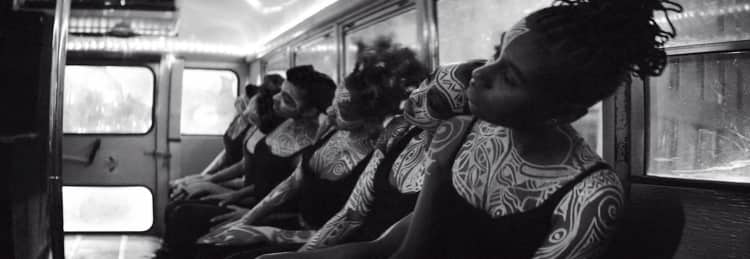 black tribal body paint music video