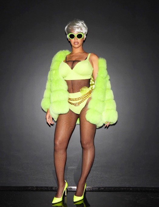 Beyoncé pays homage to Lil Kim for Halloween with 5 iconic looks. 