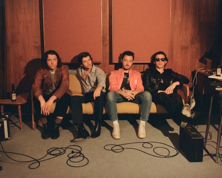 Arctic Monkeys share new song “There’d Better Be A Mirrorball”