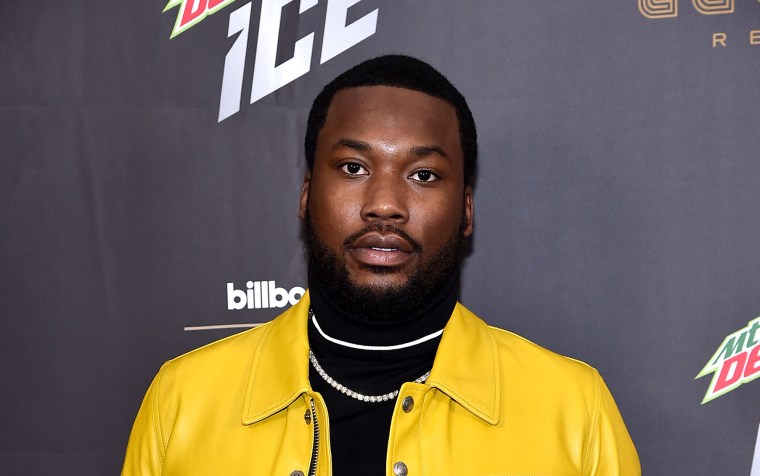 Meek Mill Getting A Haircut On The Beach In His Louis Vuitton Poncho Is A  Mood