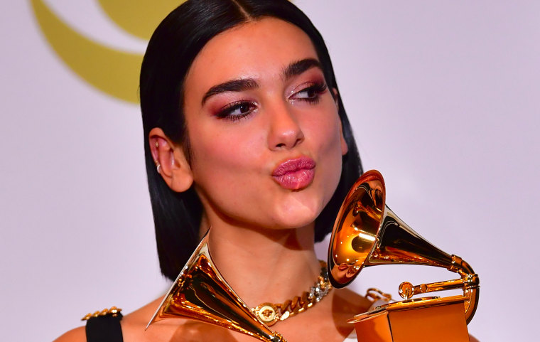 Dua Lipa expanded on her “step up” comment at a Grammys press conference