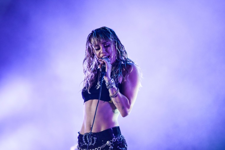 Watch Miley Cyrus’ emotional VMAs performance of “Slide Away”