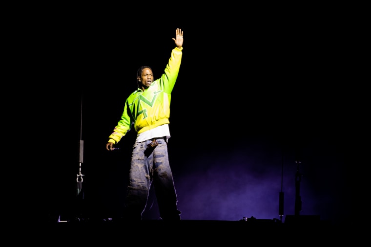 Rap Artist Travis Scott reacts after throwing the first pitch before  News Photo - Getty Images