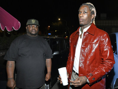 Young Thug charged with seven new felonies after raid on home