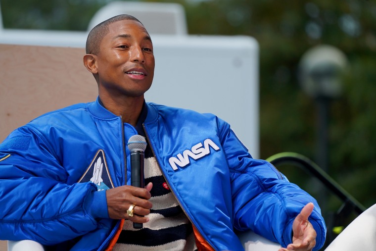 Pharrell and Son Throw First Pitch at New York Yankees Game