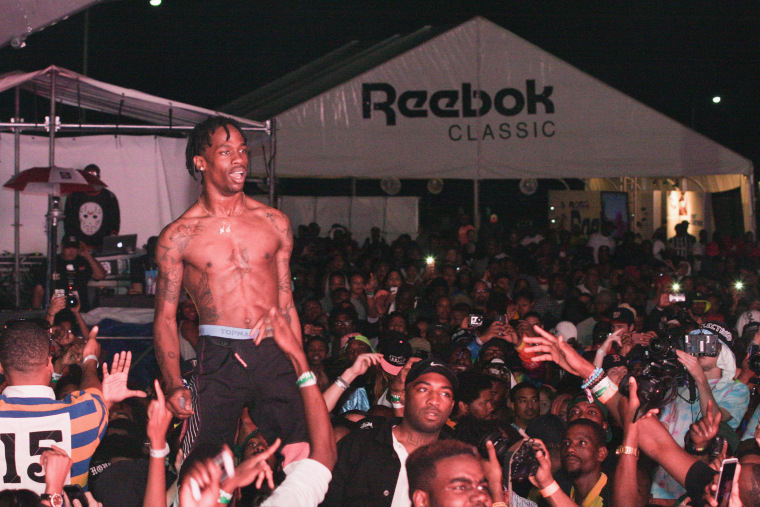 Travi$ Scott’s Lollapalooza Set Shut Down After Audience Crashes Stage
