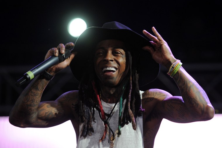 Birdman Allegedly Threw A Drink At Lil Wayne Last Night