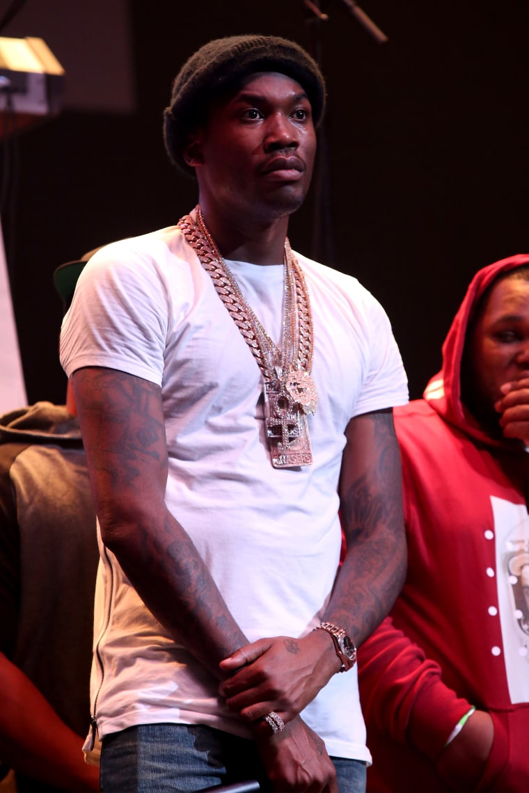 Meek Mill In Our Purple Basketball Sweatpants.