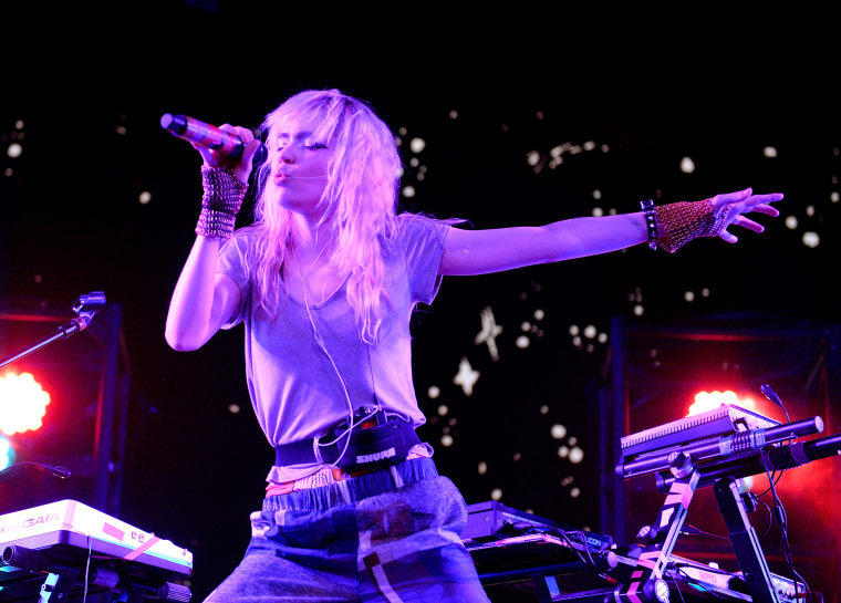 Grimes announces new music release date, opens merch shop