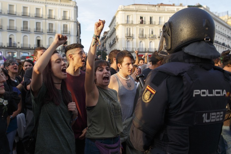 Riot police clash with referendum voters in Catalonia, leaving nearly 900 injured