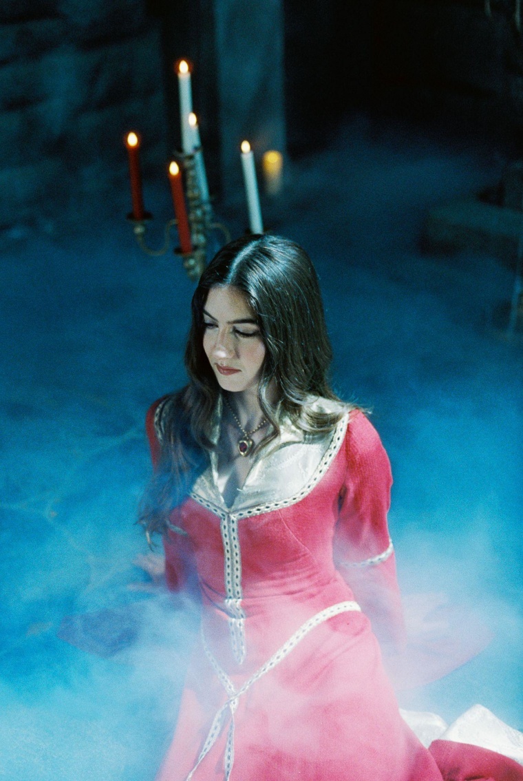 Weyes Blood shares “God Turn Me Into a Flower” video directed by Adam Curtis